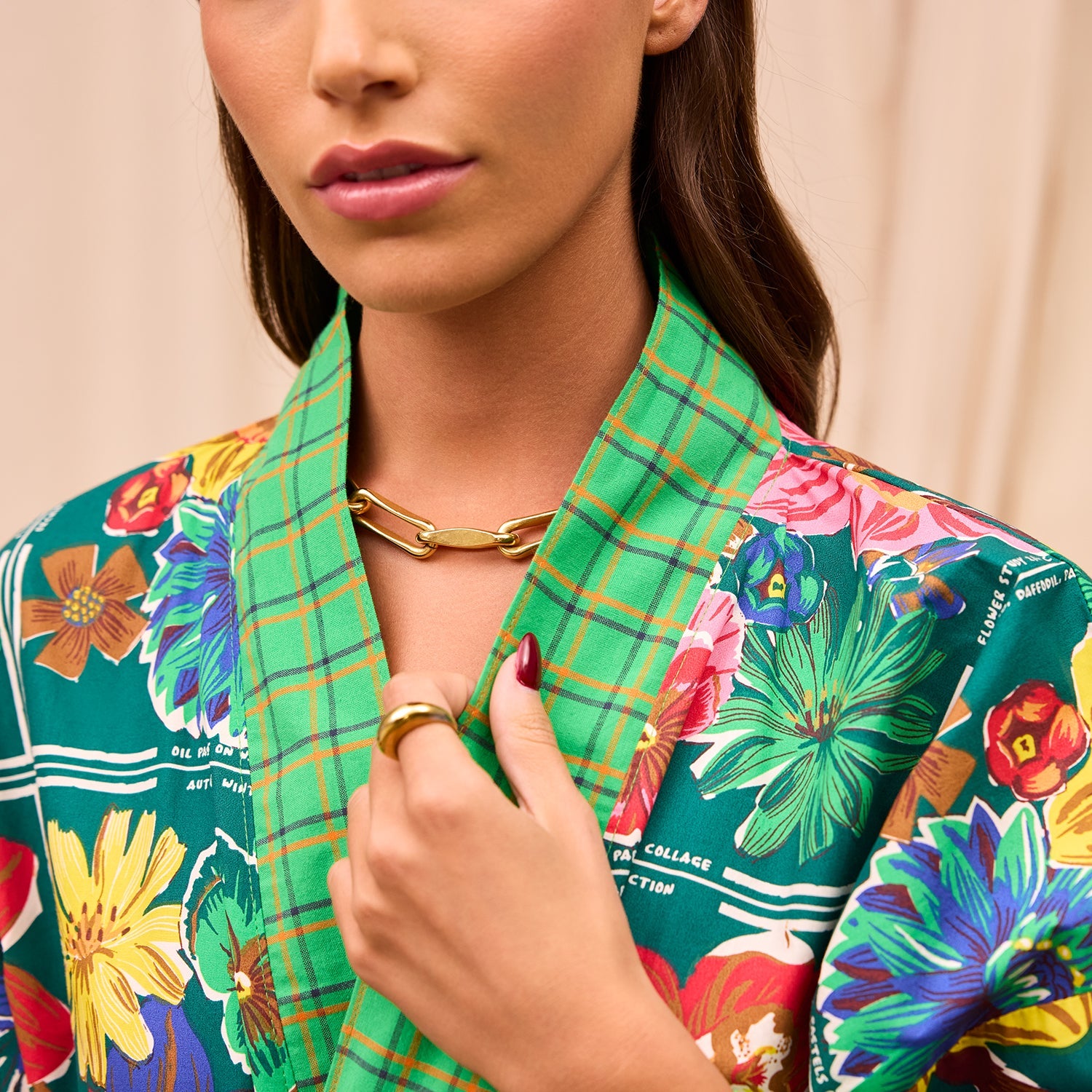 Close-up detail of Ines Cotton Robe collar showing intricate floral pattern and plaid fabric combination