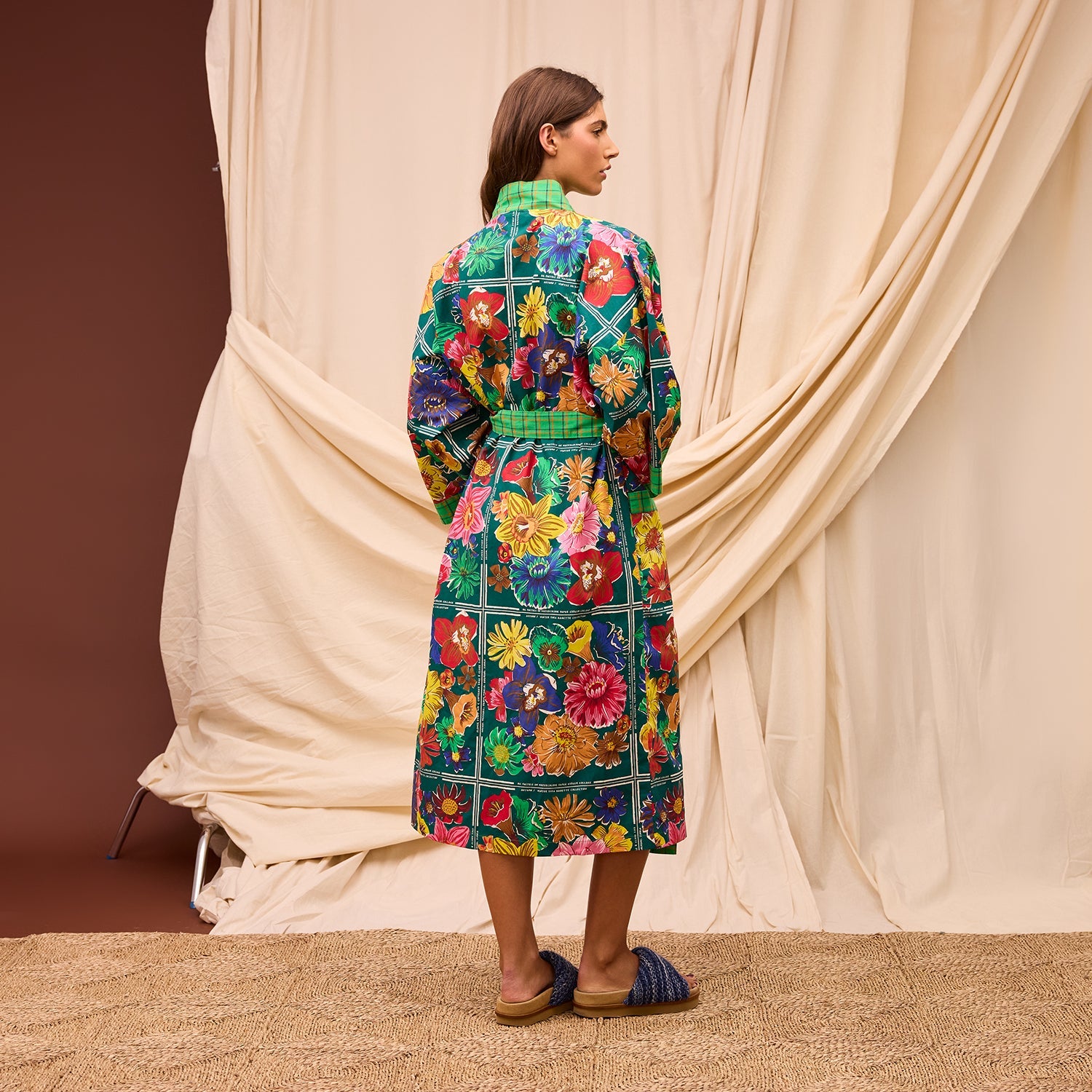 Back view of Ines Cotton Robe highlighting wide bell sleeves and maximalist aesthetic design