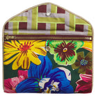 Interior view of silk pouch showing geometric print lining with snap closure and gold zipper