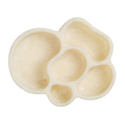 Top view of cream colored organic shaped dish showing five rounded compartments