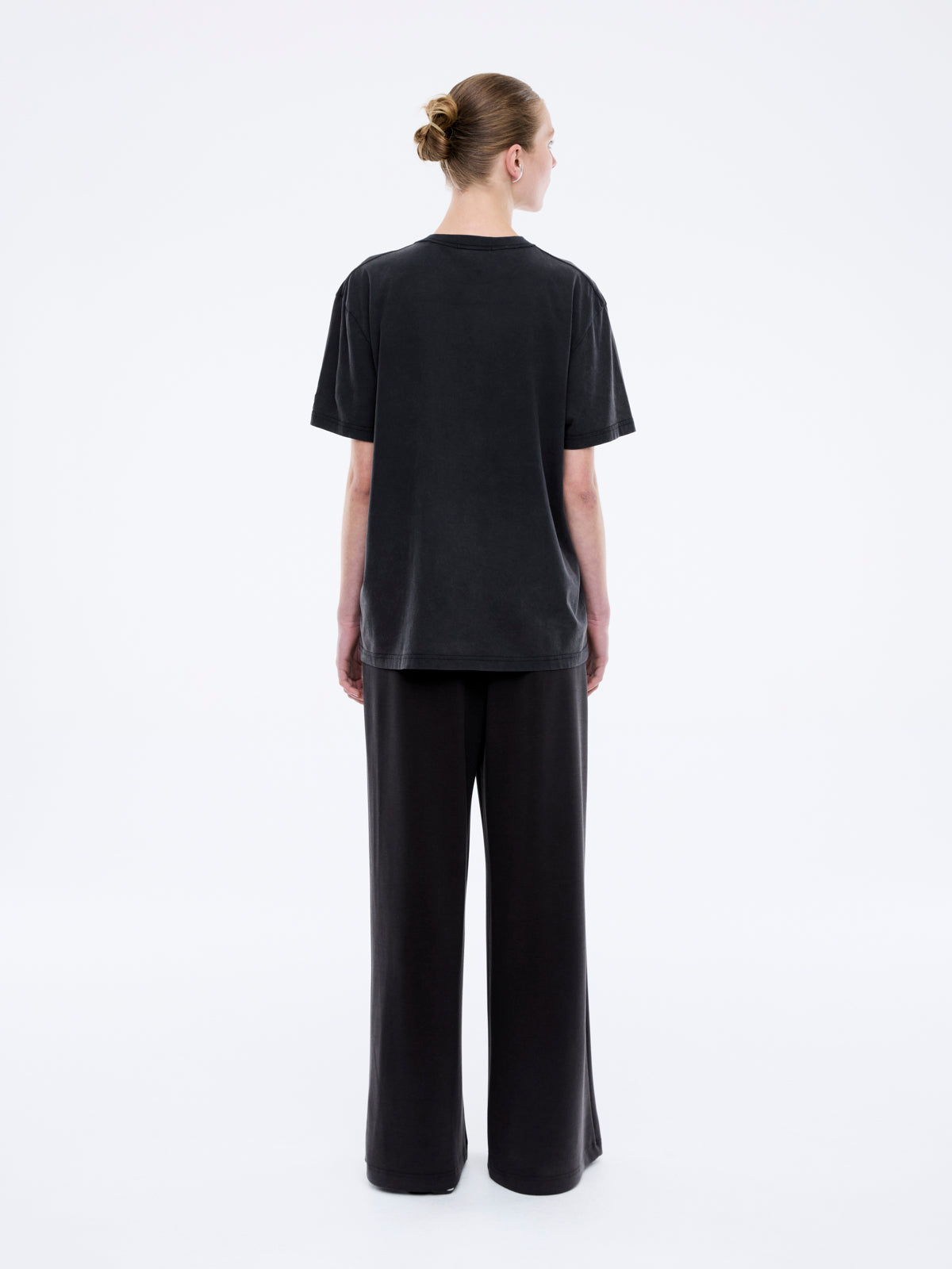 Back view of Jessie oversized tee in charcoal showing plain back design and loose silhouette