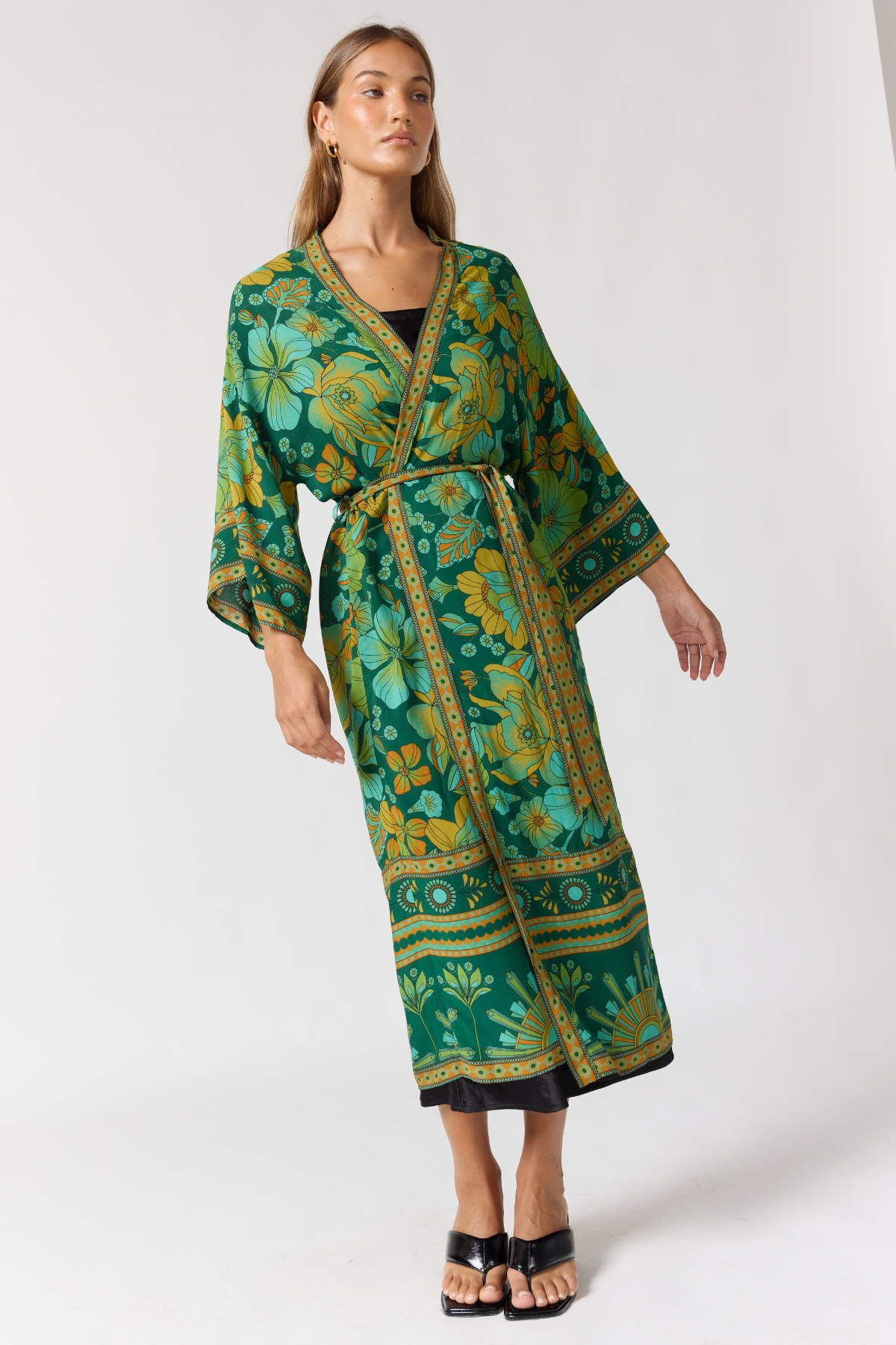 front view of jade robe showing fluid drape and statement print placement