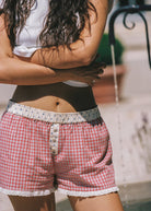 red check womens shorts with lace detailling and polka dot waist line