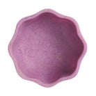 Top view of pink Joy Pedestal Bowl showing scalloped rim and marbled interior texture
