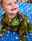 Baby in Kip & Co organic cotton zip romper for naptime