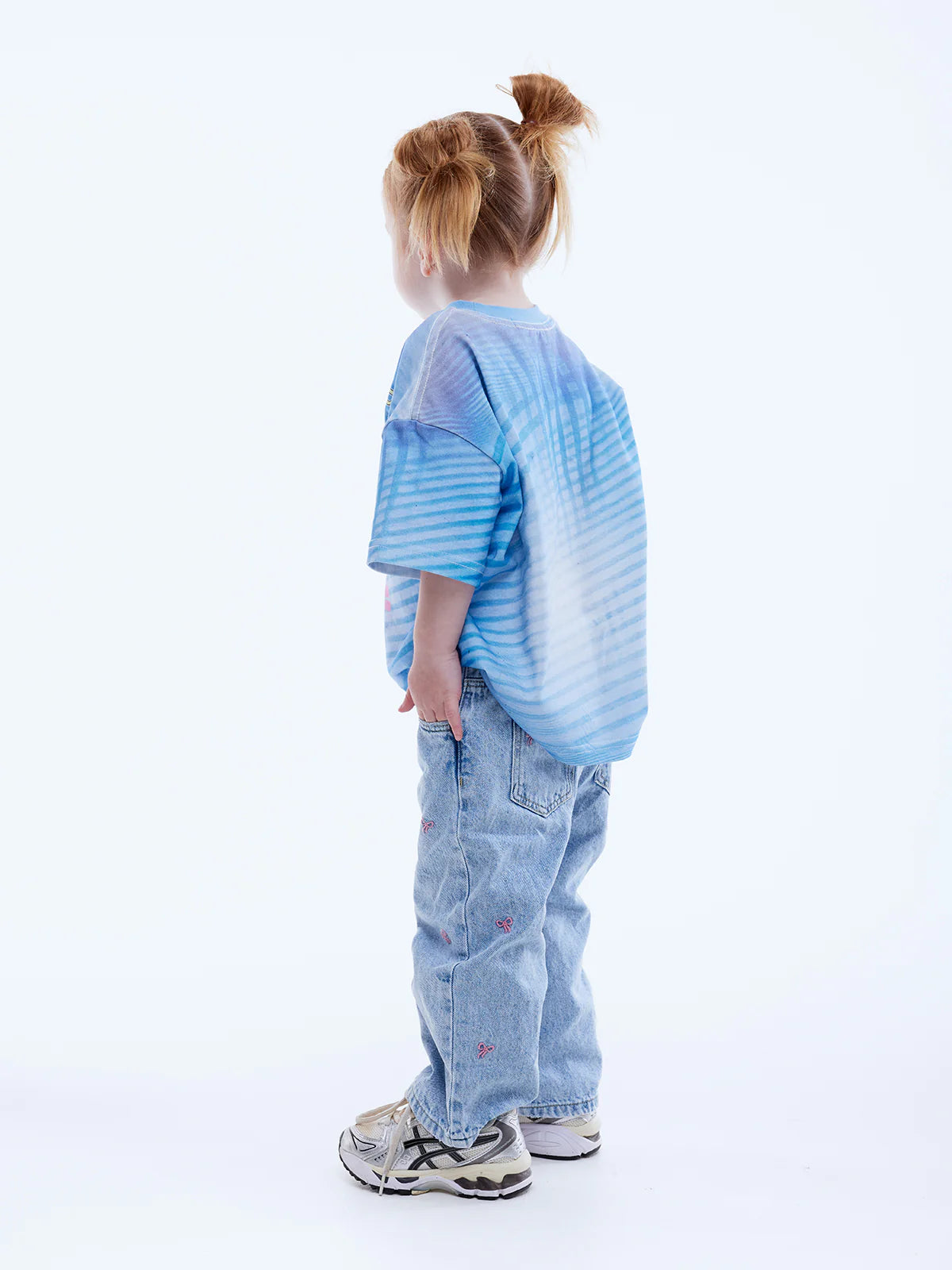 girl wearing Kids Solar Tee by Ena Pelly back view