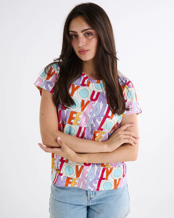 model wearing Kip & x The Beatles “All You Need Is Love” Adult Organic Cotton T-Shirt