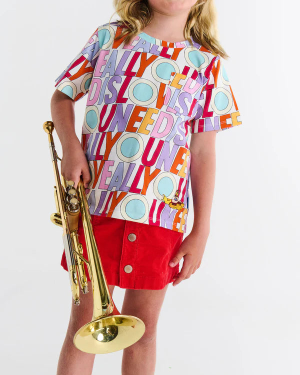 kids tshirt with the words "All You Need is Love" in pastel colours