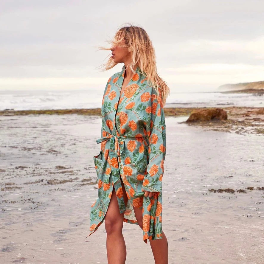 Kip and Co Perfect Posie Linen Robe on model at beach