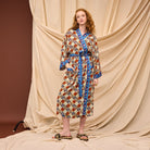 Woman wearing colorful Koa Robe