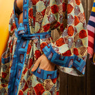 Close-up of Koa Robe silky lyocell fabric texture showing beautiful drape and flow