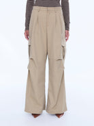 Rear close-up of Lainey Cargo Pant sand waistband and wide leg trouser construction details