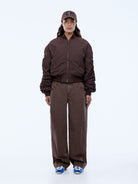 Lulu Bomber jacket flat lay showing fully lined quilted interior construction and dropped shoulders