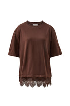 Front view of chocolate brown Lacey Tee showing oversized fit and intricate lace trim
