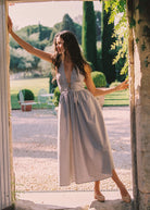 long blue check cotton dress with v neckline with functional ties