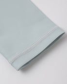 Close up of sleeve on the Long Sleeve Rashguard Seafoam | Rylee + Cru