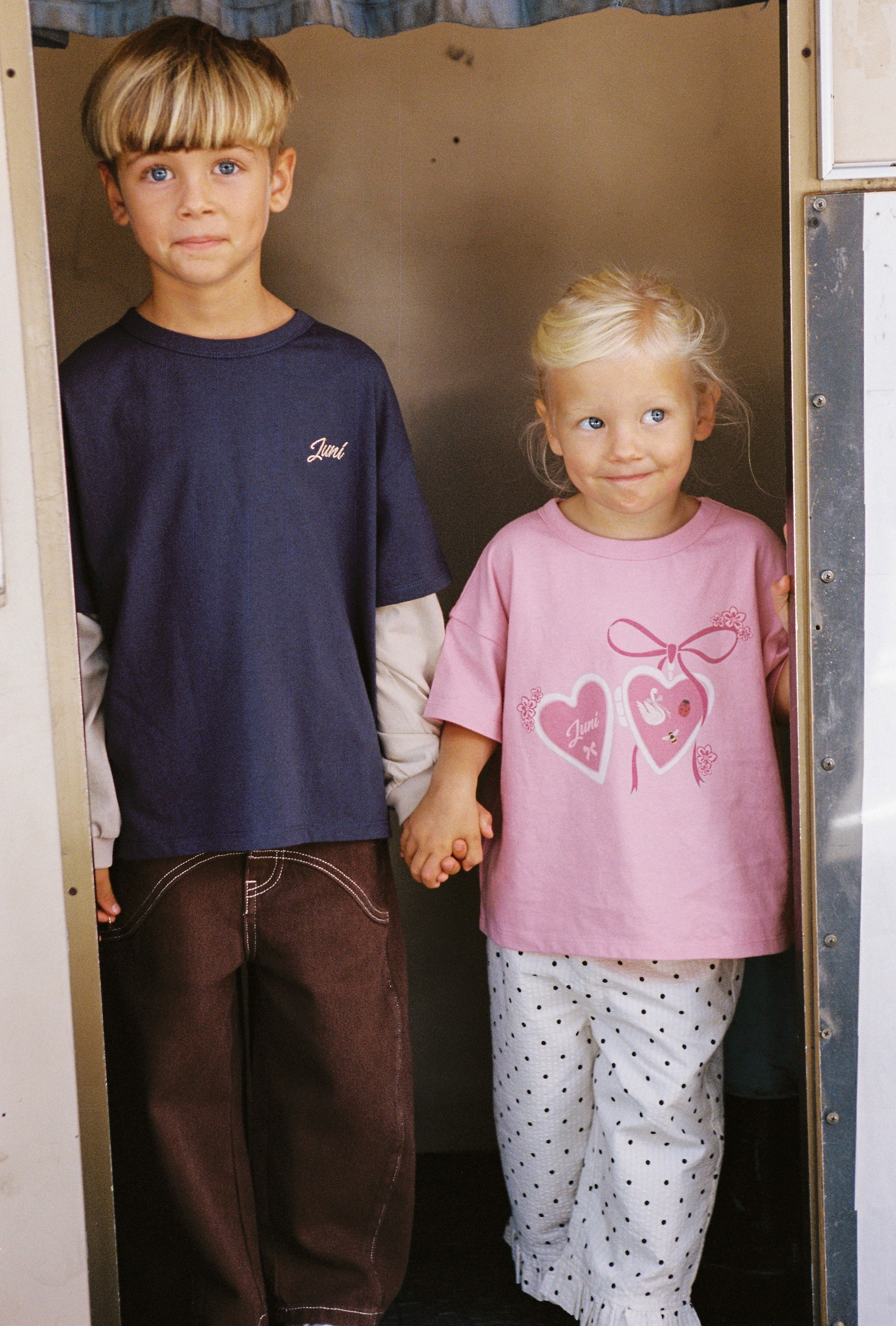 girl wearing Pink oversized tee GOTS certified organic cotton Juni