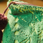 Green terry toiletry bag by Sage & Clare