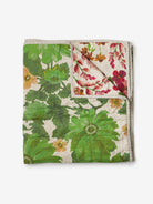 Flat lay of Lupin Multi & Marigold Leaf linen quilted throw showing reversible botanical design