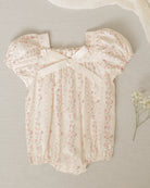 Flat lay of Lyla Romper Floral Stripe by Noralee