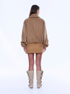 Back view of Maeve Wool Blend Bomber displaying camel wool blend fabric and cropped bomber silhouette