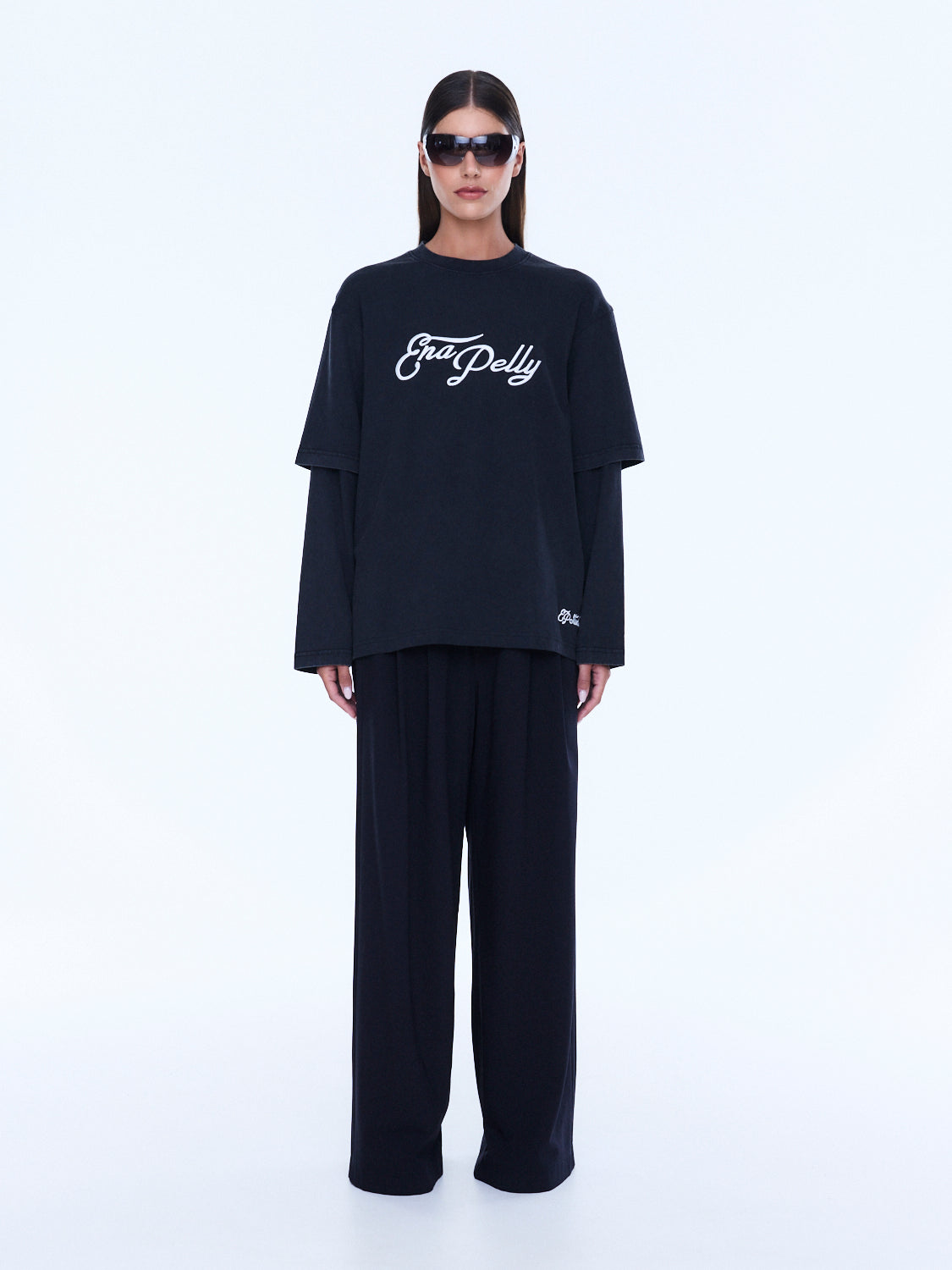 Full front view of Mock Layer Long Sleeve Tee in vintage black with white logo and layered sleeves