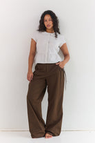 Relaxed fit espresso pants with ruched pocket detailing
