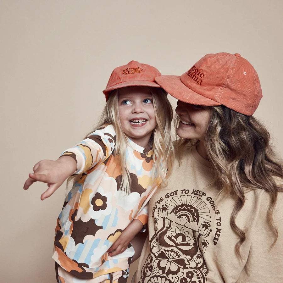 Mum wearing a Magic mama cap by Banabae and her child wearing a Magic Mini Cap by Banabae