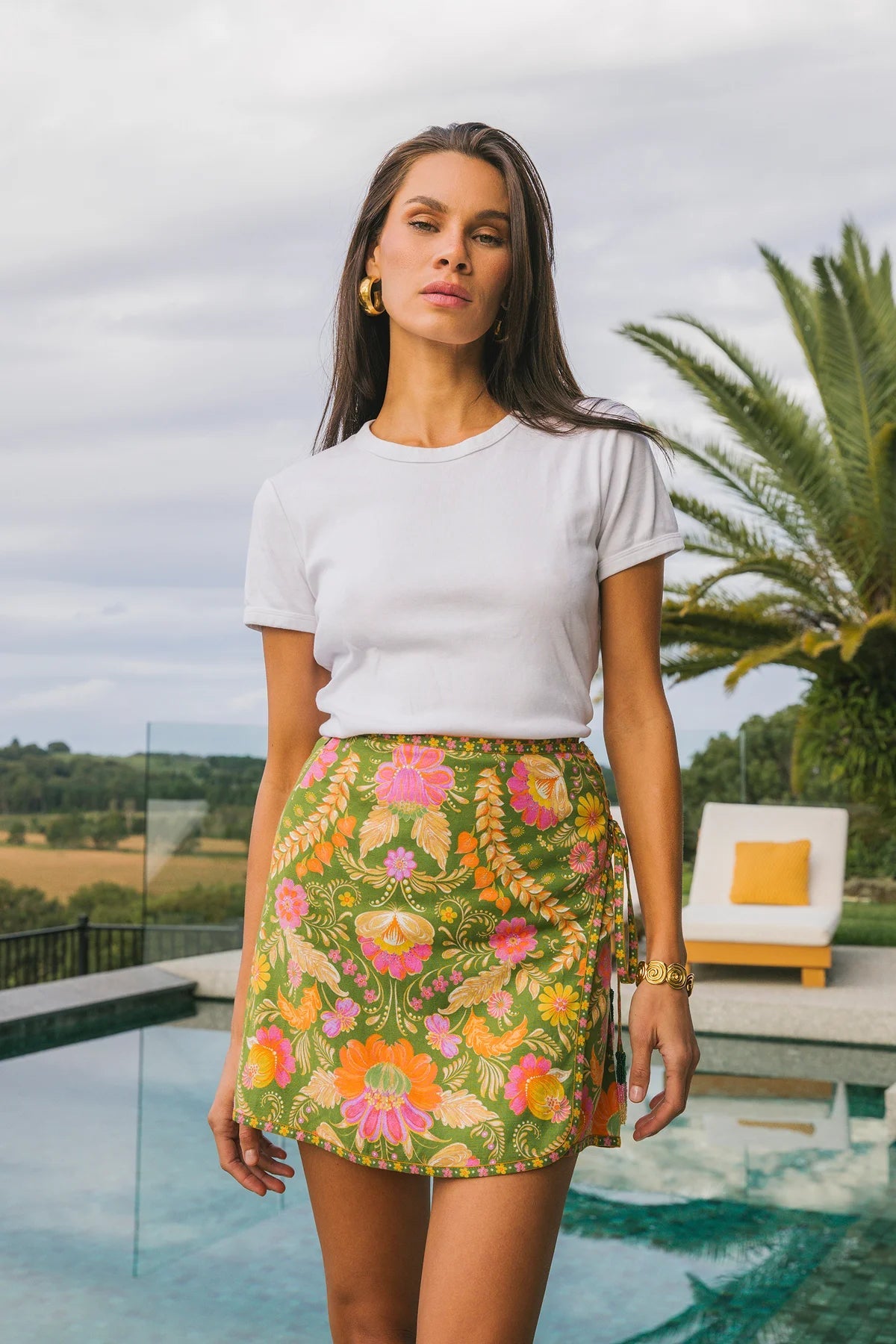 Front view Maison mini skirt showing invisible zip entry and curved wrap shape