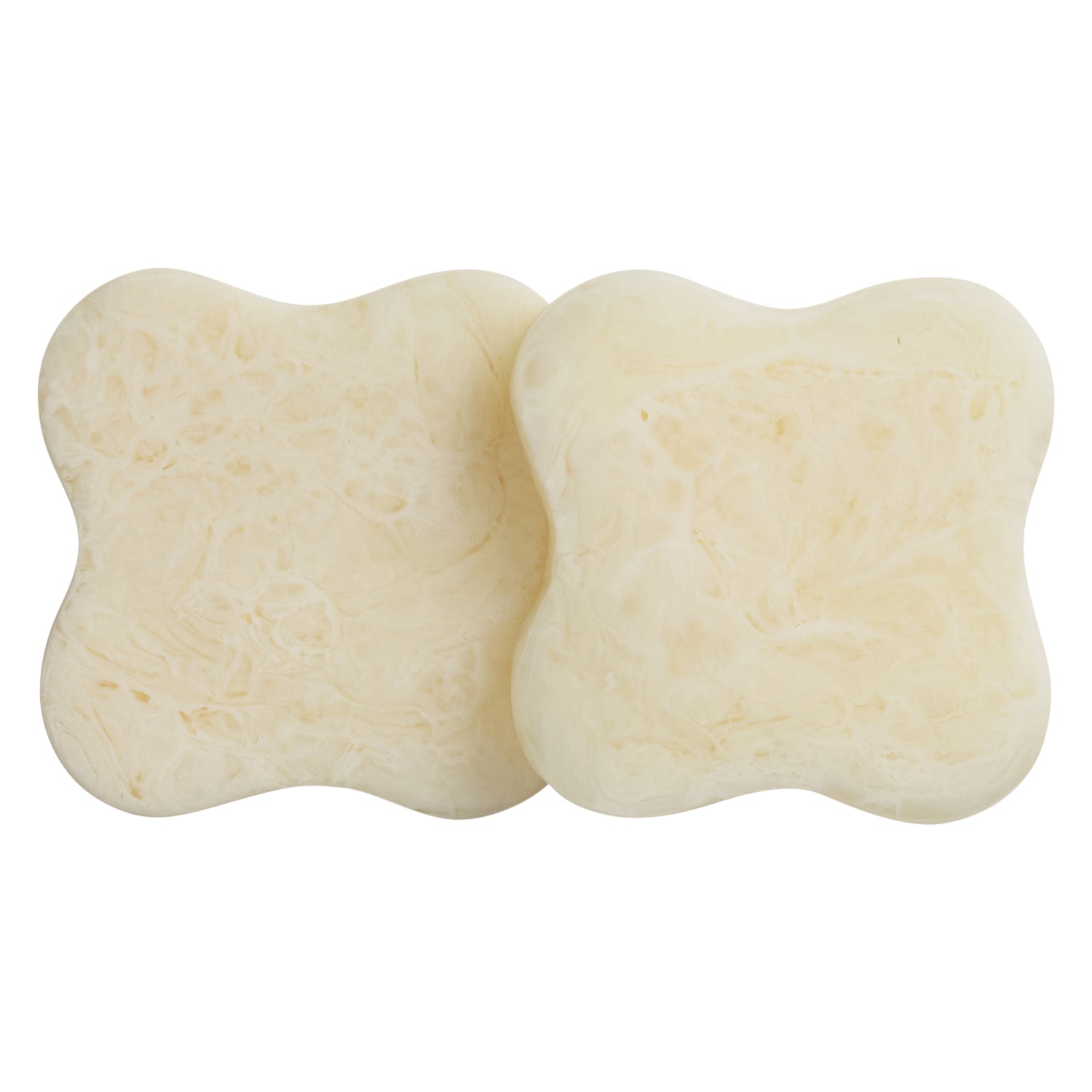 Set of 2 pearl cream marbled resin coasters with curved square shape, soft ivory swirl texture, top view