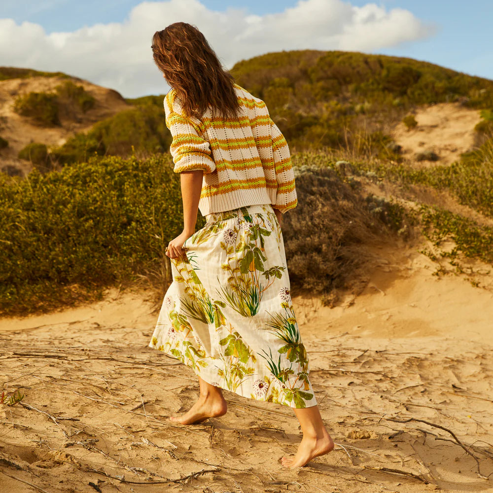 green and yellow floral maxi skirt with shirring around the waist