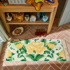 Margaret Bath Runner by Sage & Clare - long floral bath runner with a floral design in green and yellow on a cream base. Fringed edges