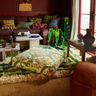 dog bed with floral retro pattern in green and yellow