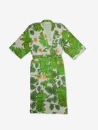 Front view of Marigold Leaf Linen Robe with green botanical print and yellow flowers showing tie belt closure