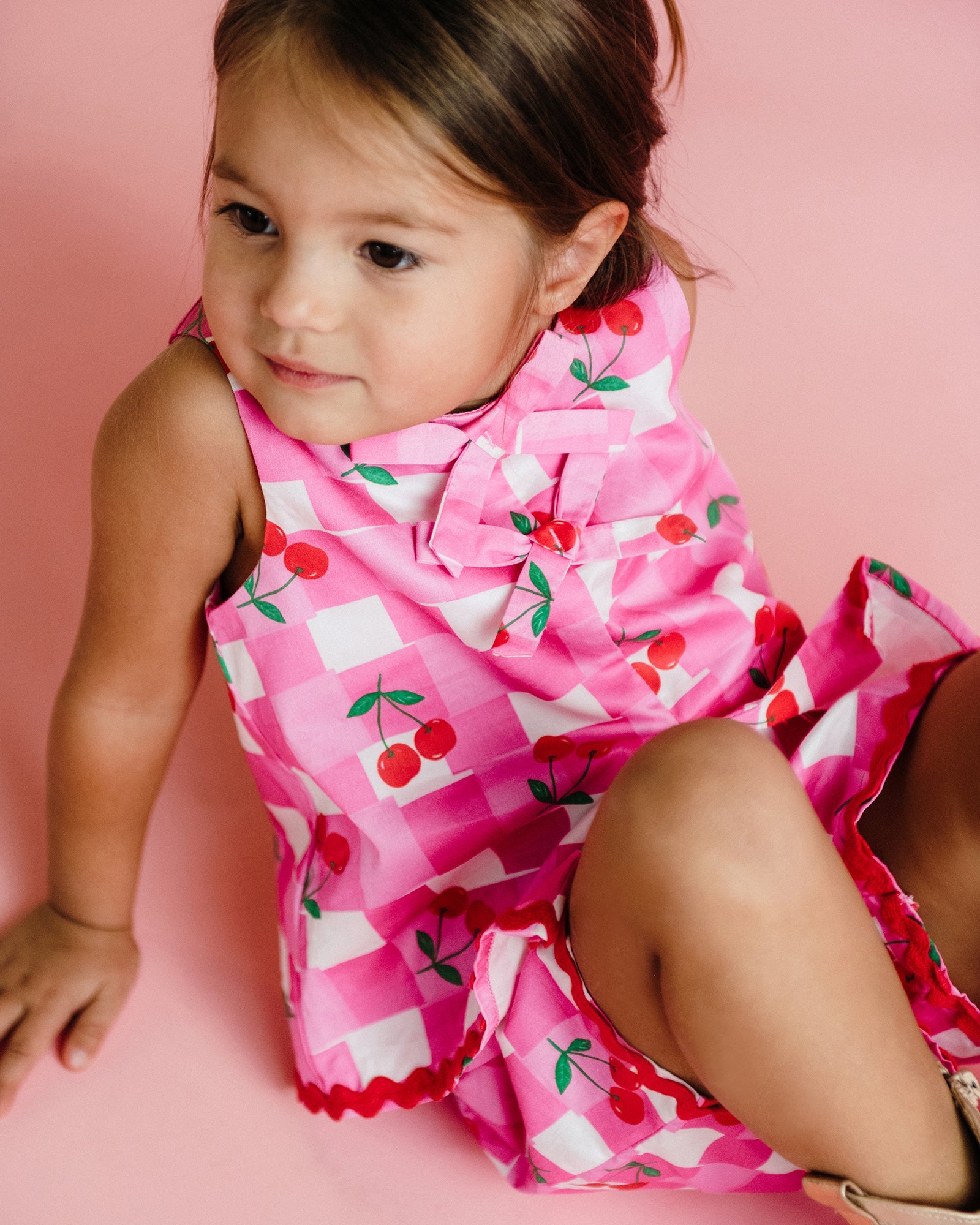 Front view of young girl wearing the Mary Woven Set - Gingham | Rock Your Baby