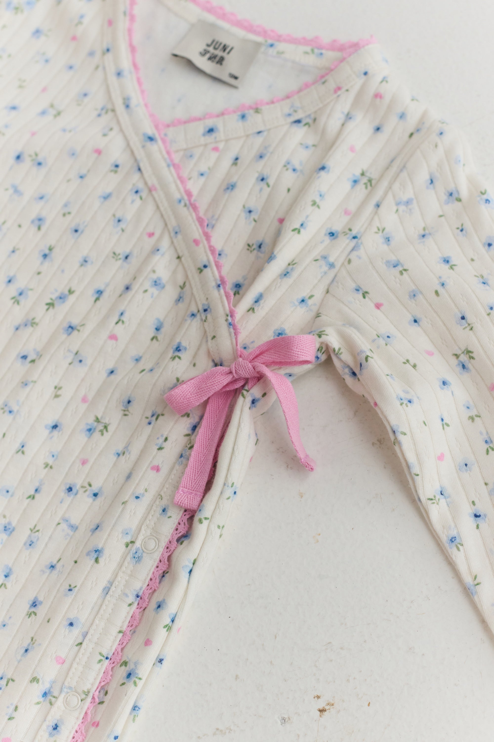 Juni organic cotton baby onesie pointelle fabric Australia