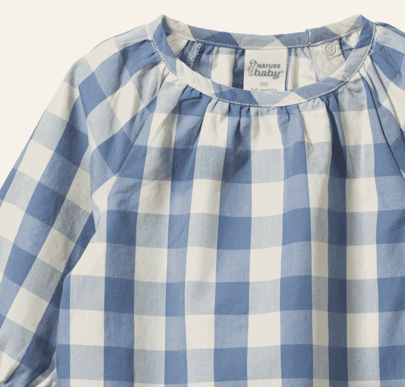 Close up on neckline of the Meadow Bodysuit Gingham - Bluebelle Check | Nature Baby