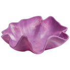 Top-down view of empty orchid ceramic bowl showing interior texture and scalloped rim