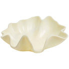 Side view of pearl ceramic bowl with flowers showing curved fluted rim detail