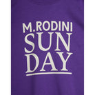 Mini Rodini kids tee details - Sunday lettering in white on a purple background