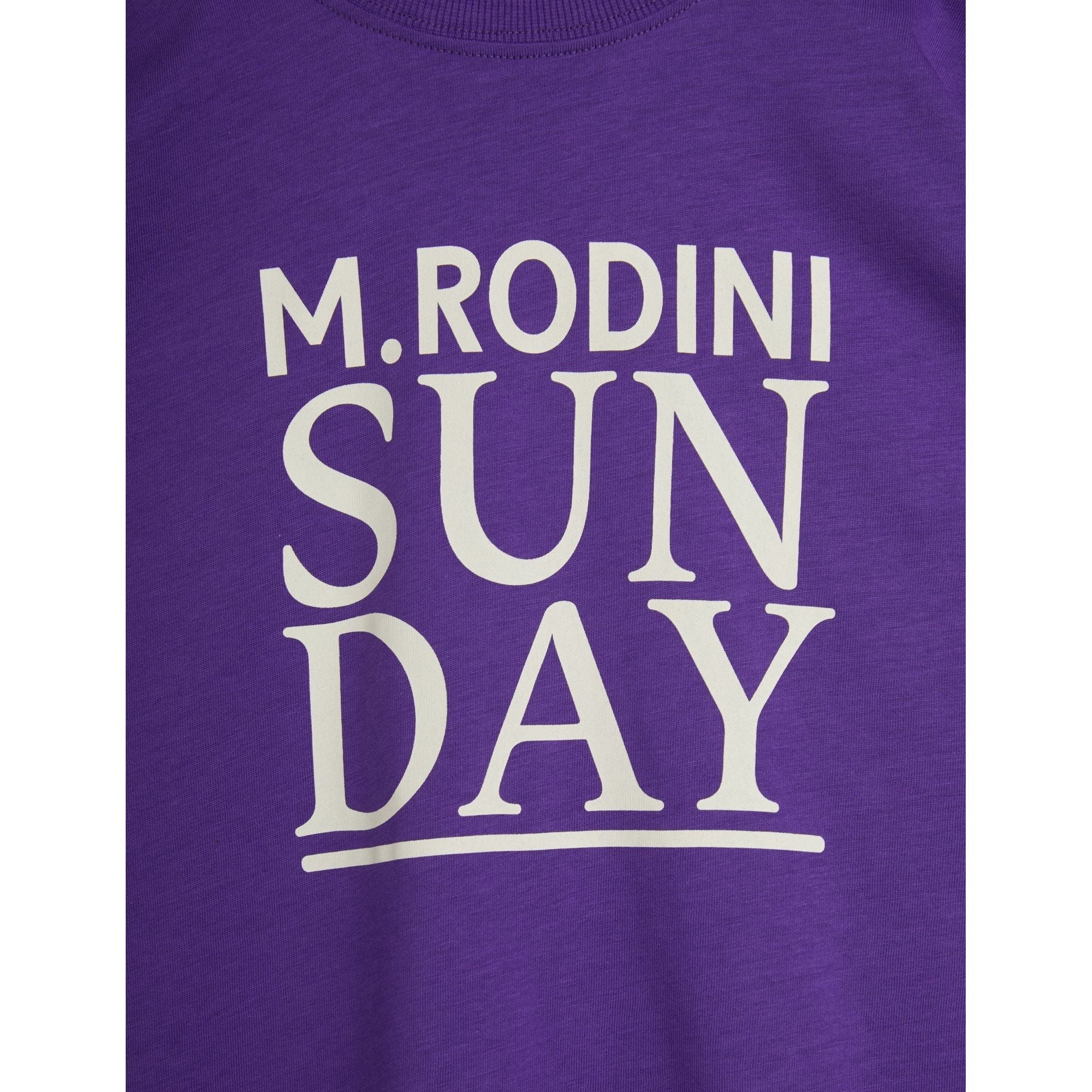 Mini Rodini kids tee details - Sunday lettering in white on a purple background