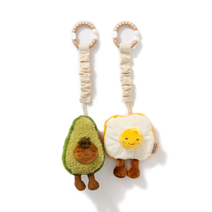 avocado and egg stroller toy by Living Textiles
