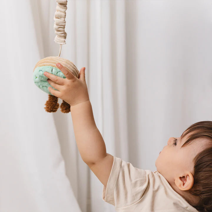 baby playing with 2 Pack Mini Market Brunch Stroller Toys - Boba Tea & Donut by Living Textiles