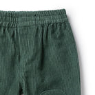 Waist and fabric detailing close up of teh Moss Green Organic Cord Pant | Wilson + Frenchy