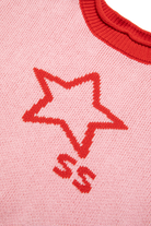 Close-up detail of red star outline and SS lettering on pink knit sweater fabric
