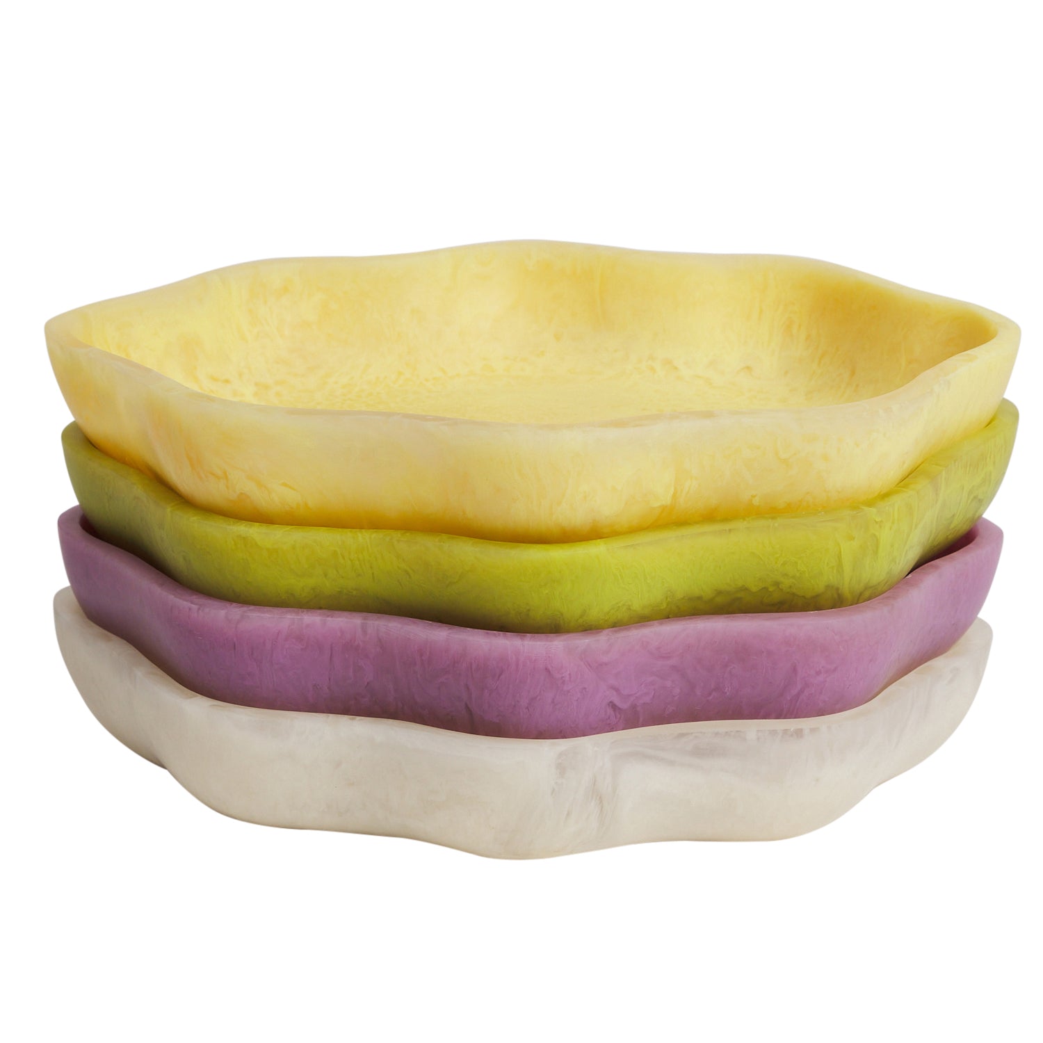 Stack of four colorful ceramic serving dishes in yellow, green, pink and cream tones