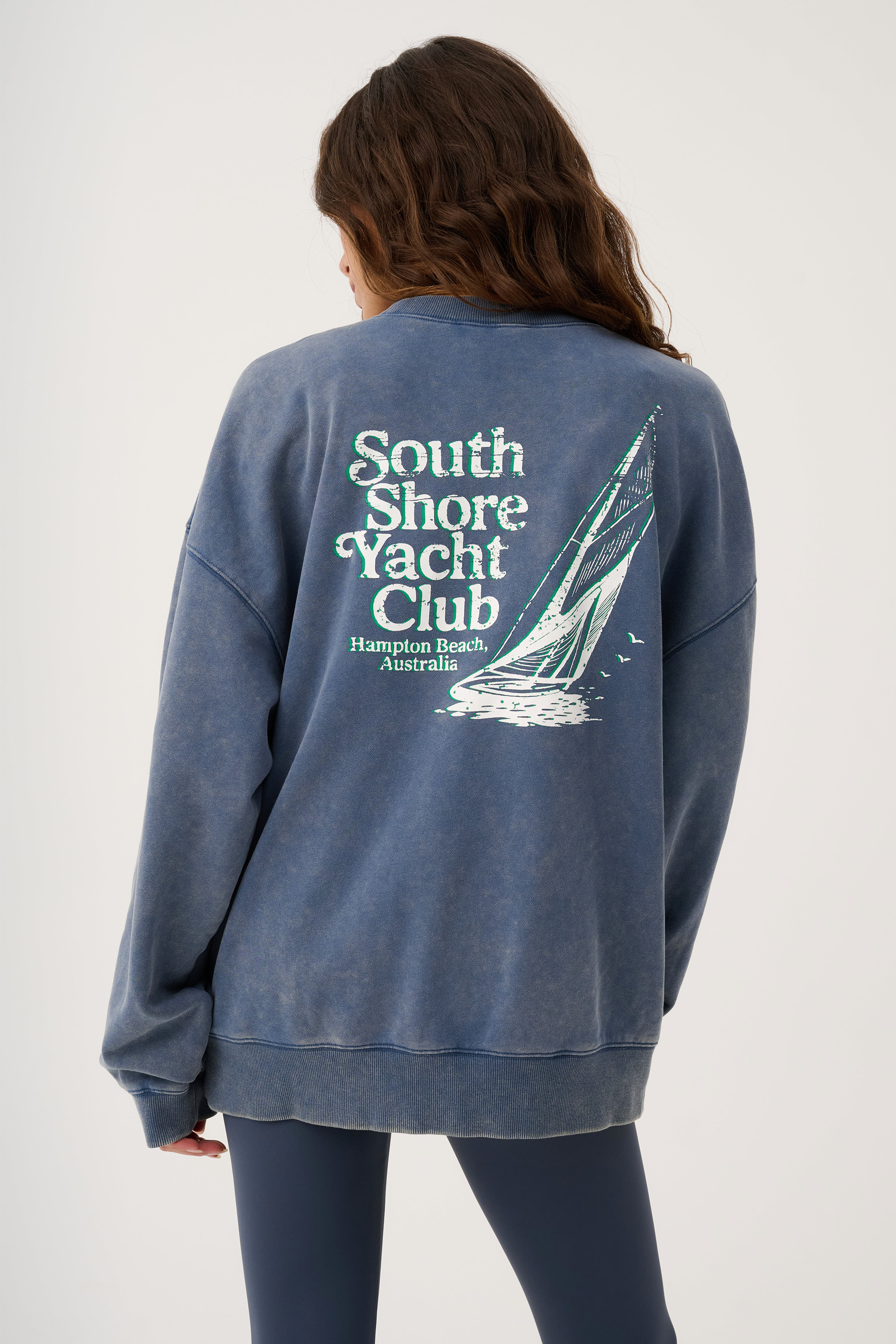 Back view of Nina Sweater showing South Shore Yacht Club graphic print with sailboat design