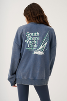 Back view of Nina Sweater showing South Shore Yacht Club graphic print with sailboat design