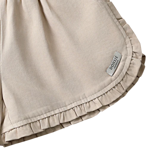 Fabric and stitching detail of Niven Shorts in Soft Taupe colour by Donsje