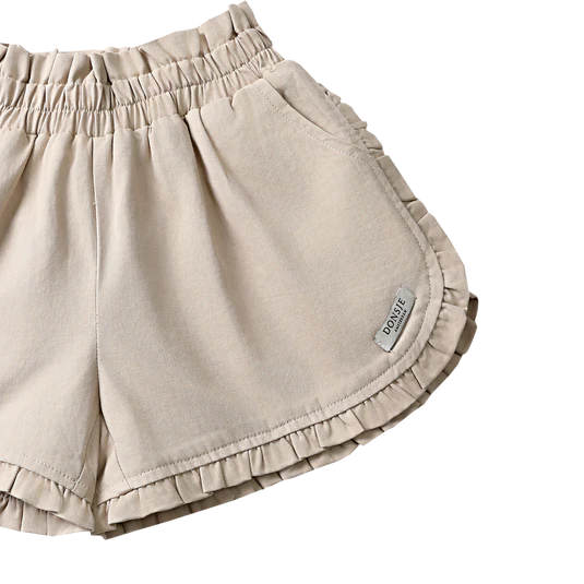 Fabric and stitching detail of Niven Shorts in Soft Taupe colour by Donsje